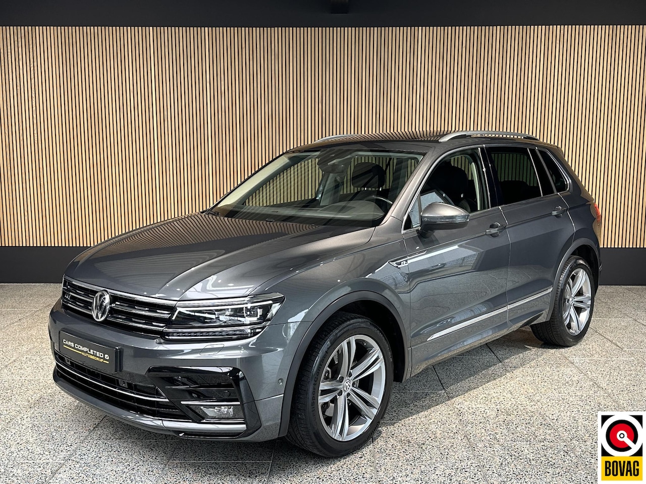 Volkswagen Tiguan - 2.0 TSI 4Motion Highline Lederen bekleding | Schuif kantel dak | Trekhaak - AutoWereld.nl