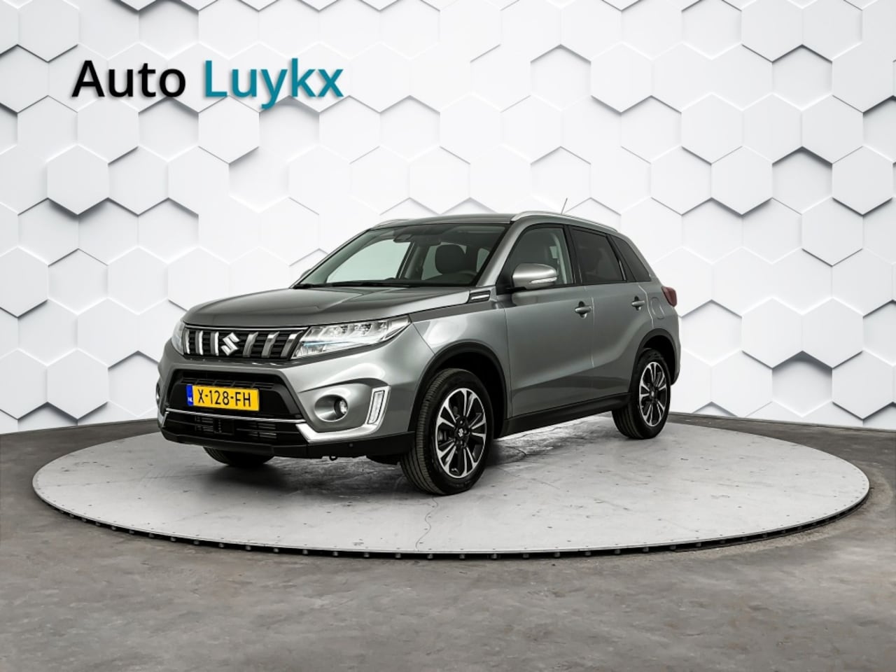 Suzuki Vitara - 1.4 Boosterjet Style Smart Hybrid | 6 jaar Fabrieksgarantie | Leder/Alcantara | Adaptieve - AutoWereld.nl