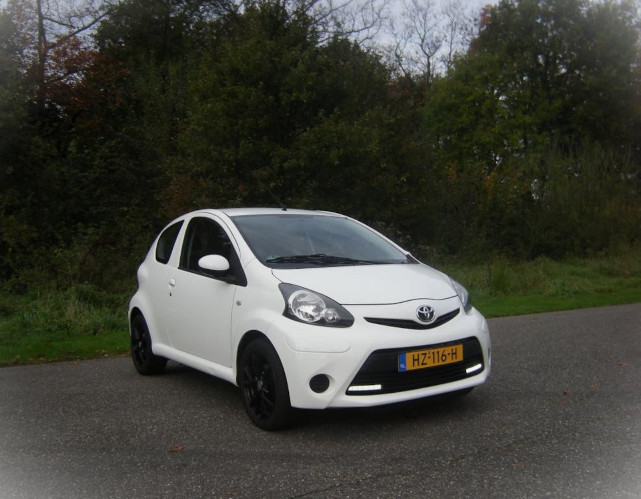 Toyota Aygo - 1.0 VVT-i Comfort Orange . Airco . Elec ramen . LMV . enz - AutoWereld.nl