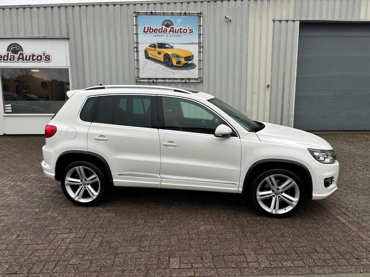 Volkswagen Tiguan - 2.0 TSI Track&Field 4Motion 4X4 R-LINE BJ 2012-11750E - AutoWereld.nl