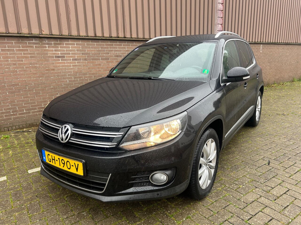 Volkswagen Tiguan - 1.4 TSI Sport&Style Navi Clima PDC Cruise - AutoWereld.nl