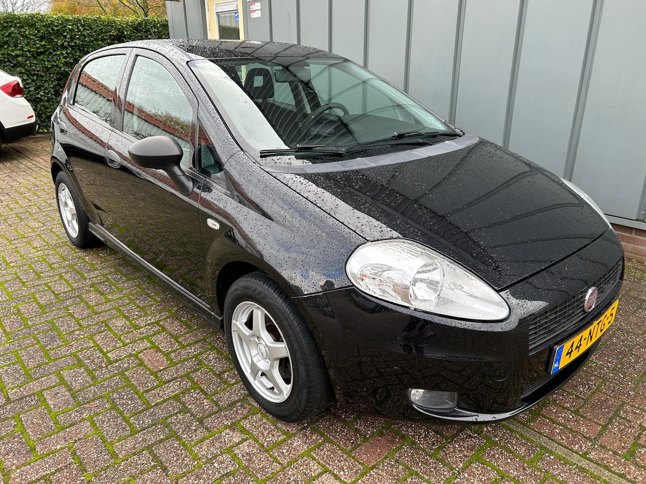 Fiat Grande Punto - 1.3 M-Jet Actual NAP//AIRCO//CV+AB//TREKHAAK//ELEC.RAMEN - AutoWereld.nl