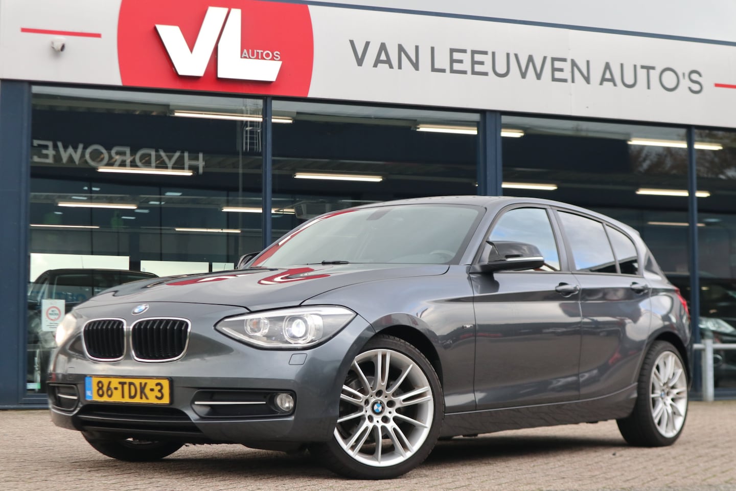 BMW 1-serie - 116i Business+ | Navi | Clima | Leren bekleding | - AutoWereld.nl