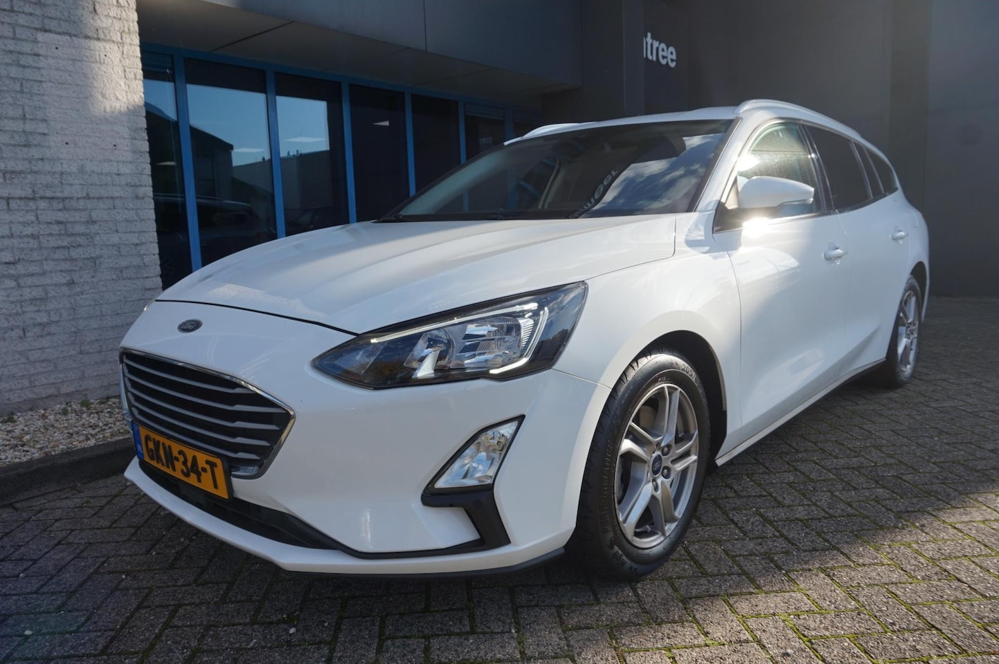 Ford Focus Wagon - 1.0 EcoBoost 125PK Titanium Automaat|Navi|Adapt. Cruise| PDC V+A - AutoWereld.nl