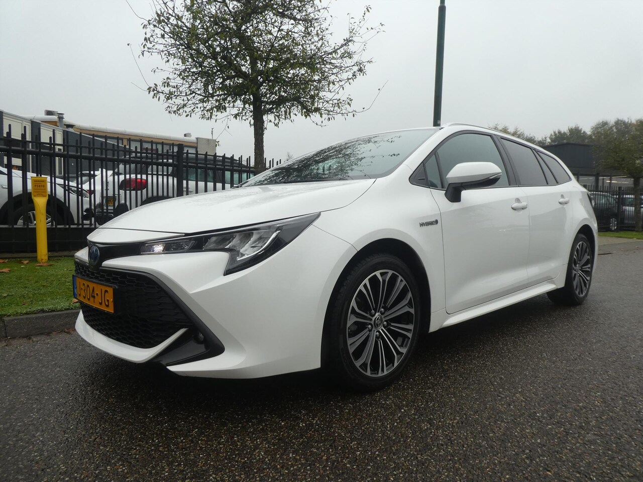 Toyota Corolla Touring Sports - 1.8 Hybrid 122pk CVT Business Plus Apple Car Play 32.633 KM NL-Auto - AutoWereld.nl