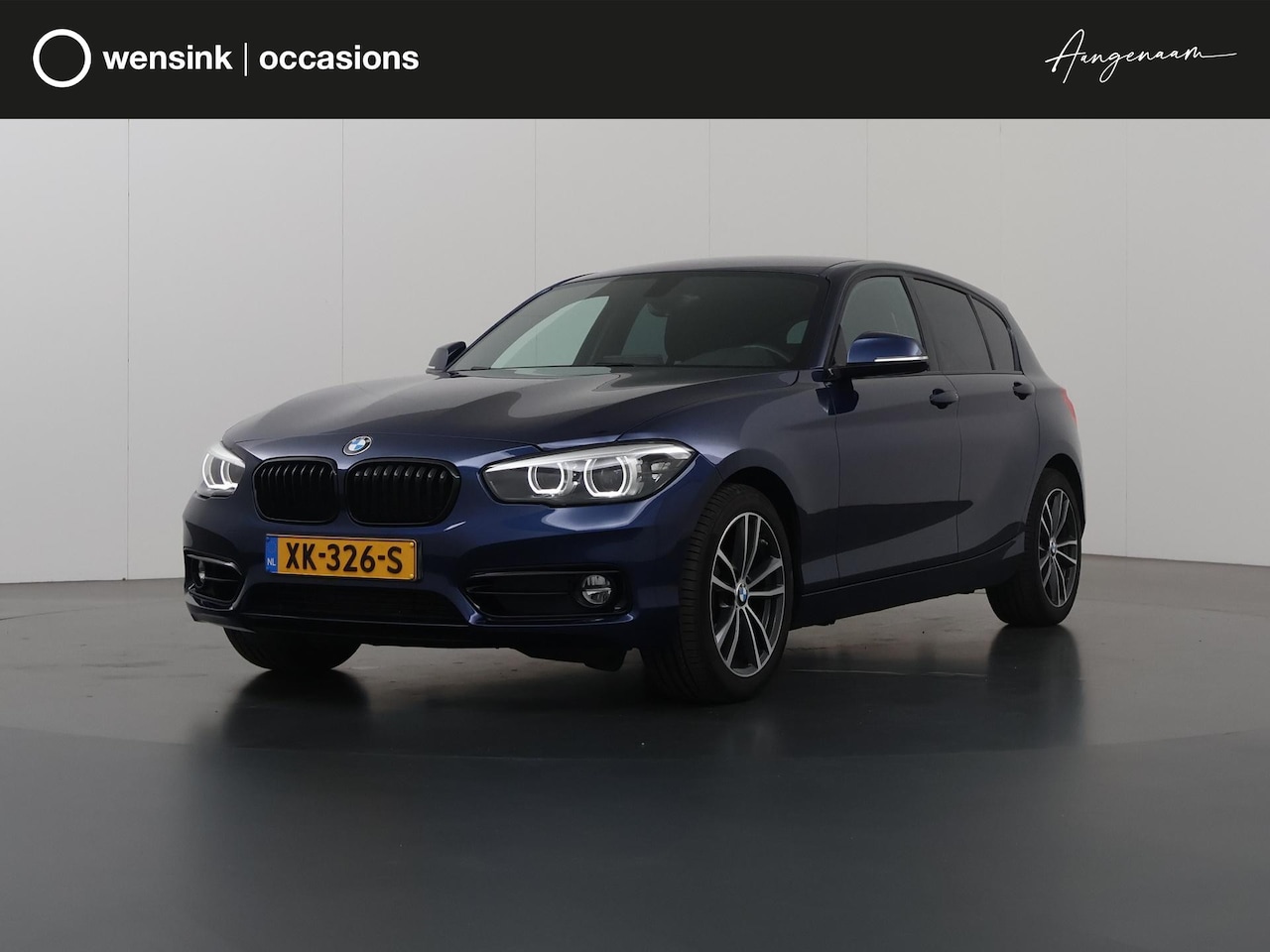 BMW 1-serie - 118i Corporate Lease Executive | Trekhaak | Sportstoelen | Navigatie | Climate Control | K - AutoWereld.nl