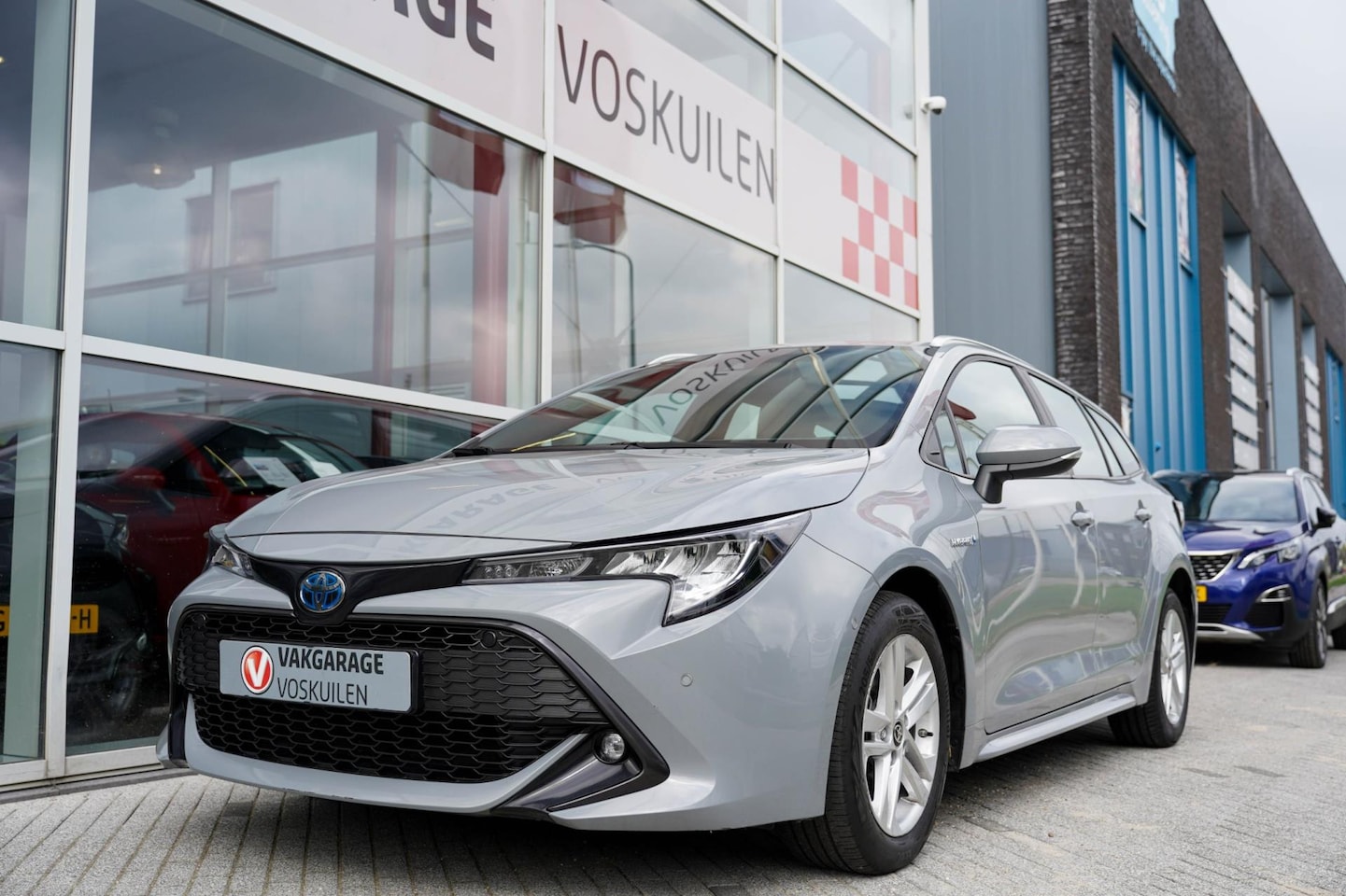 Toyota Corolla Touring Sports - 1.8 Hybrid Dynamic | Apple Carplay | Camera | Navi - AutoWereld.nl