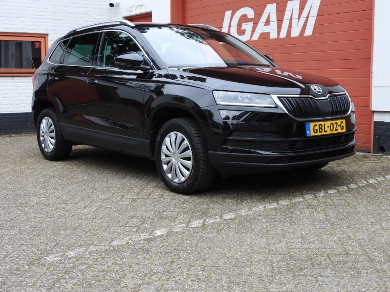 Skoda Karoq - 1.5 TSI Bns.Ed. Plus, CC airco, stoelverw. - AutoWereld.nl