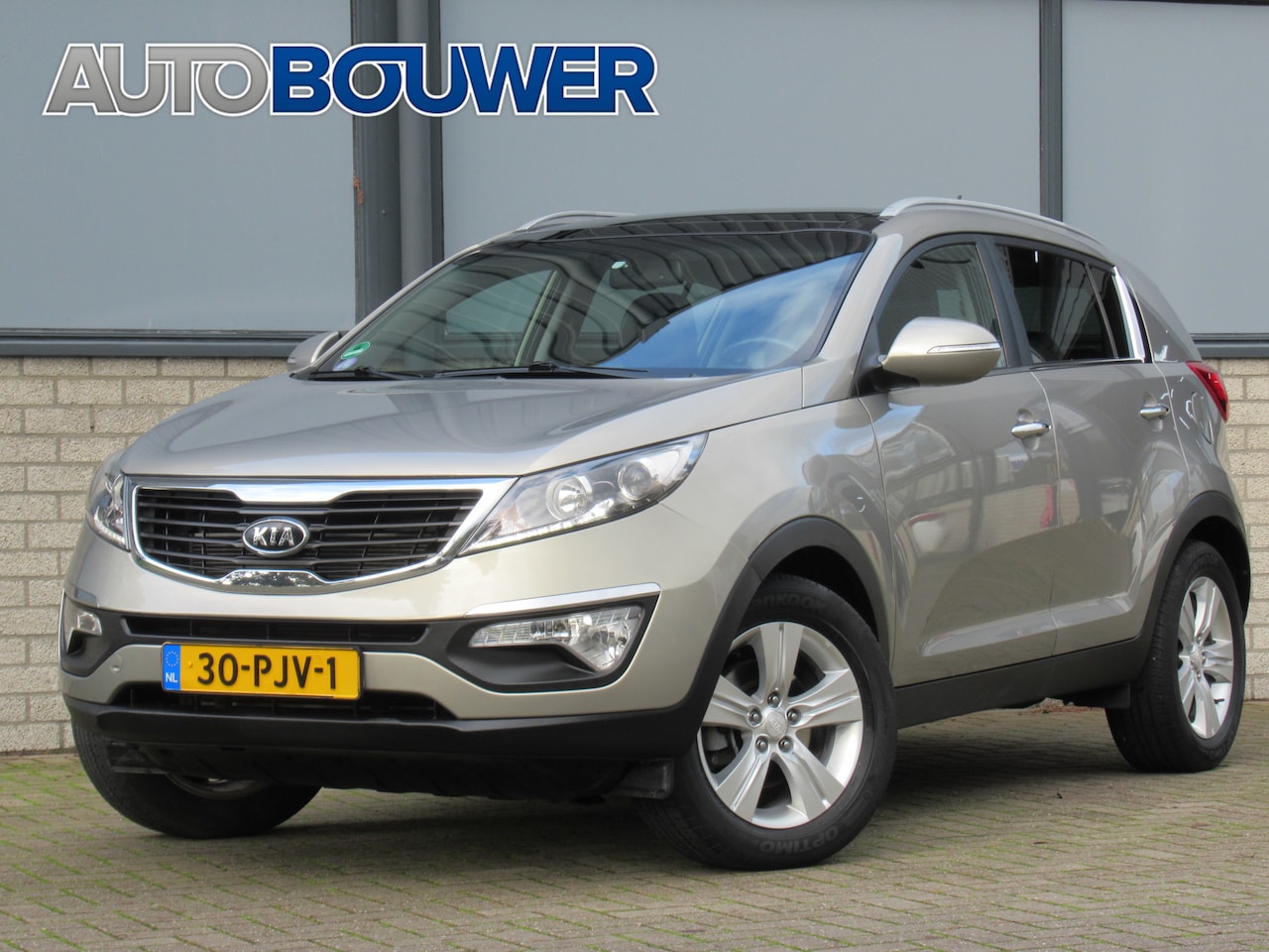 Kia Sportage - 2.0 X-ecutive Plus Pack Panorama dak | tr.haak | clima | 1900 KG tr.gewicht - AutoWereld.nl