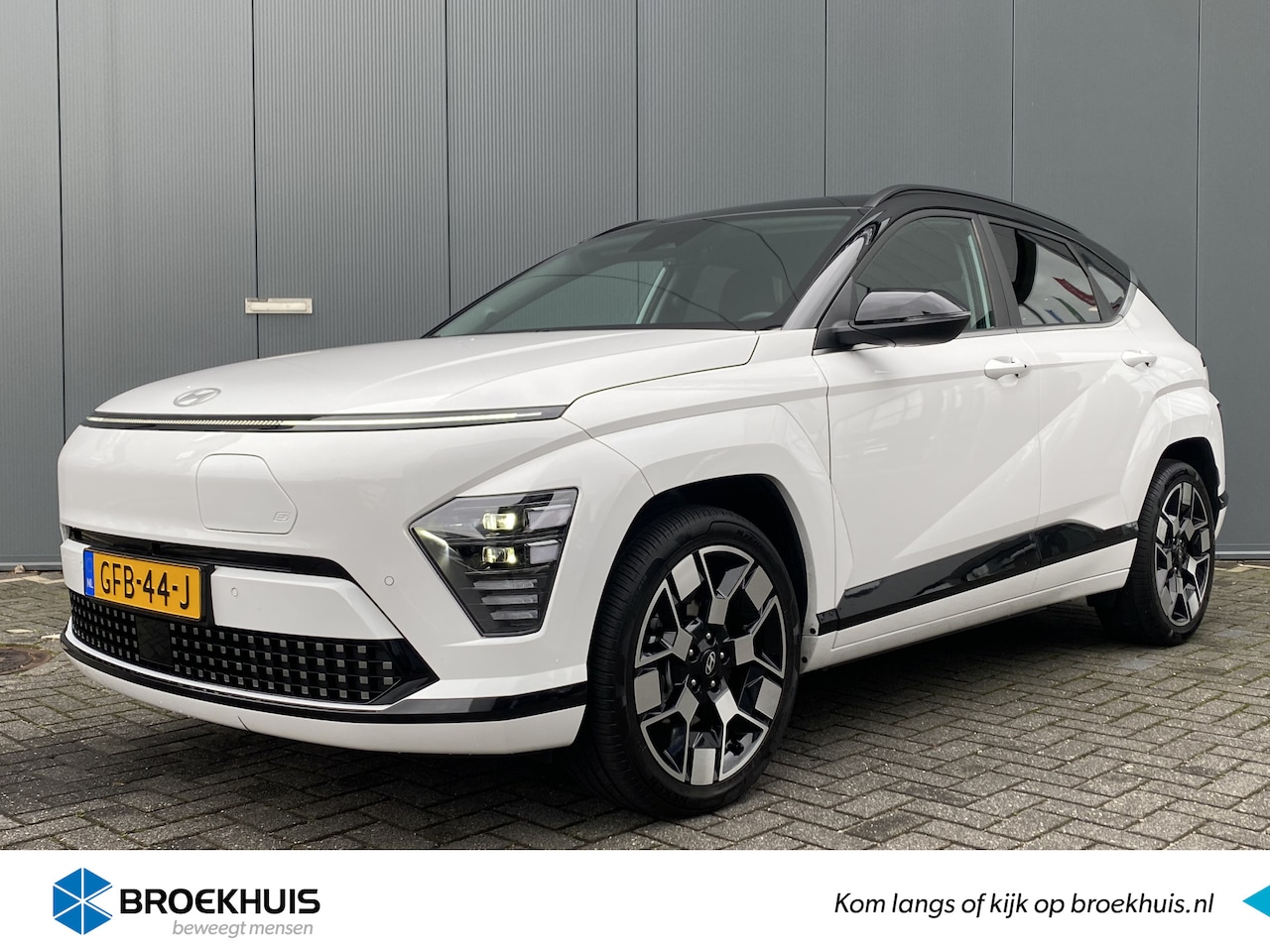 Hyundai Kona Electric - Comfort Smart 65kWh | Dodehoekdetectie | 19'' Lichtmetalen velgen | Navigatie | Adaptive c - AutoWereld.nl