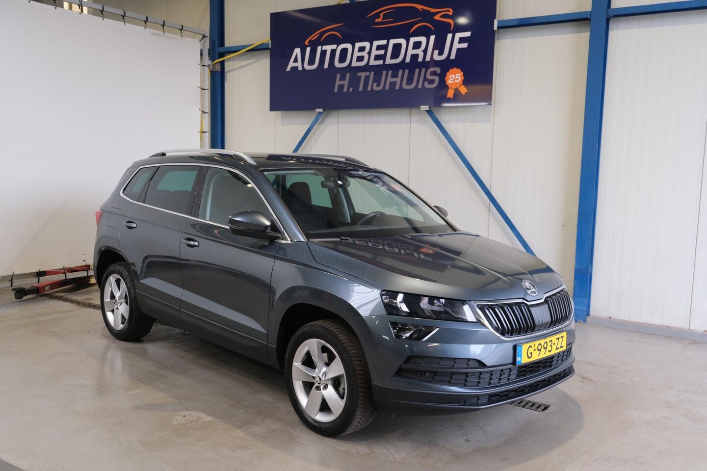 Skoda Karoq - 1.0 TSI Ambition Business Automaat - N.A.P. Airco, Navi, Cruise, PDC. - AutoWereld.nl