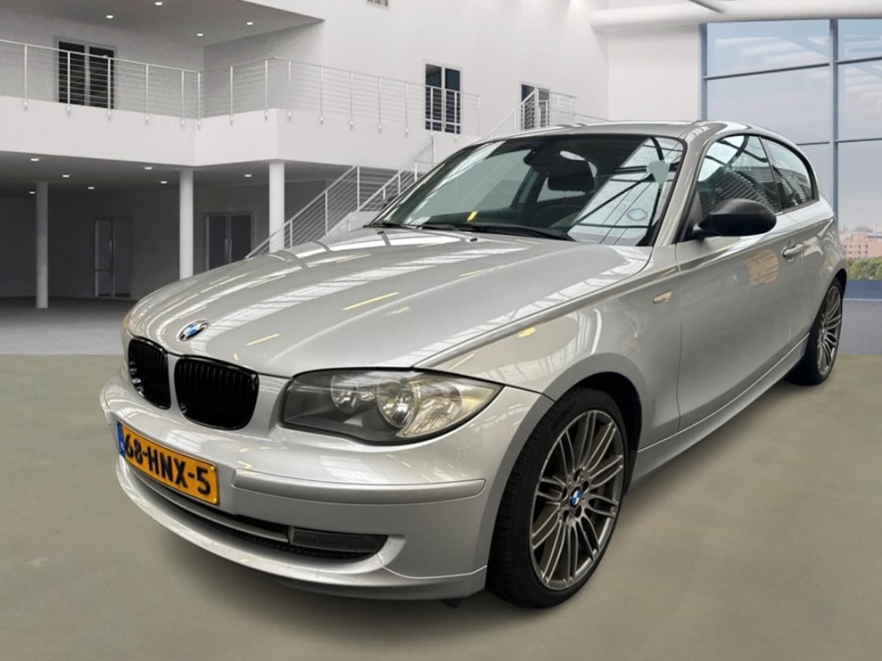 BMW 1-serie - 118i Business Line/6BAK/CARBON - AutoWereld.nl