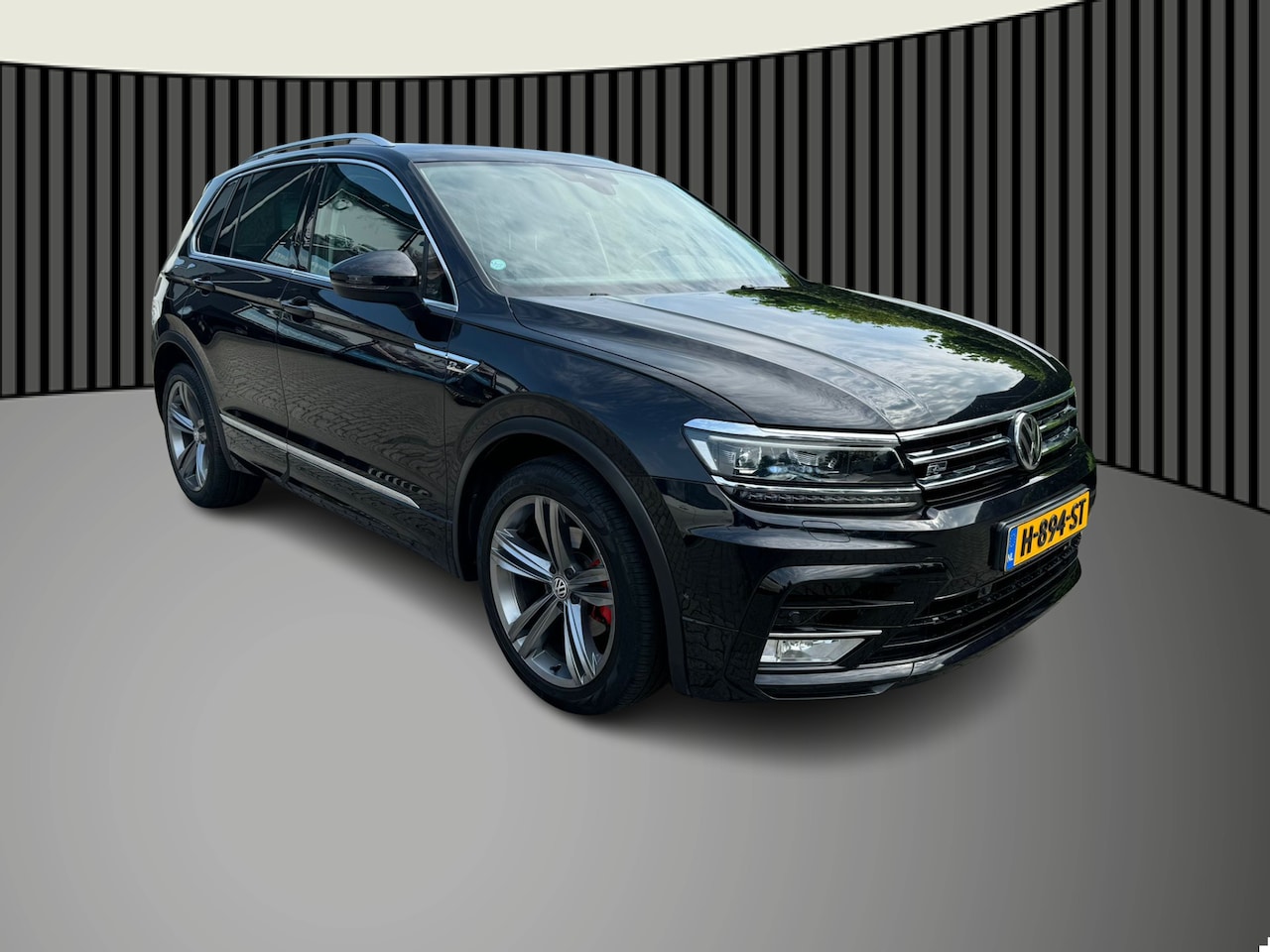 Volkswagen Tiguan - 1.4 TSI ACT R Line virtueel cockpit, cruise, navi, pano - AutoWereld.nl