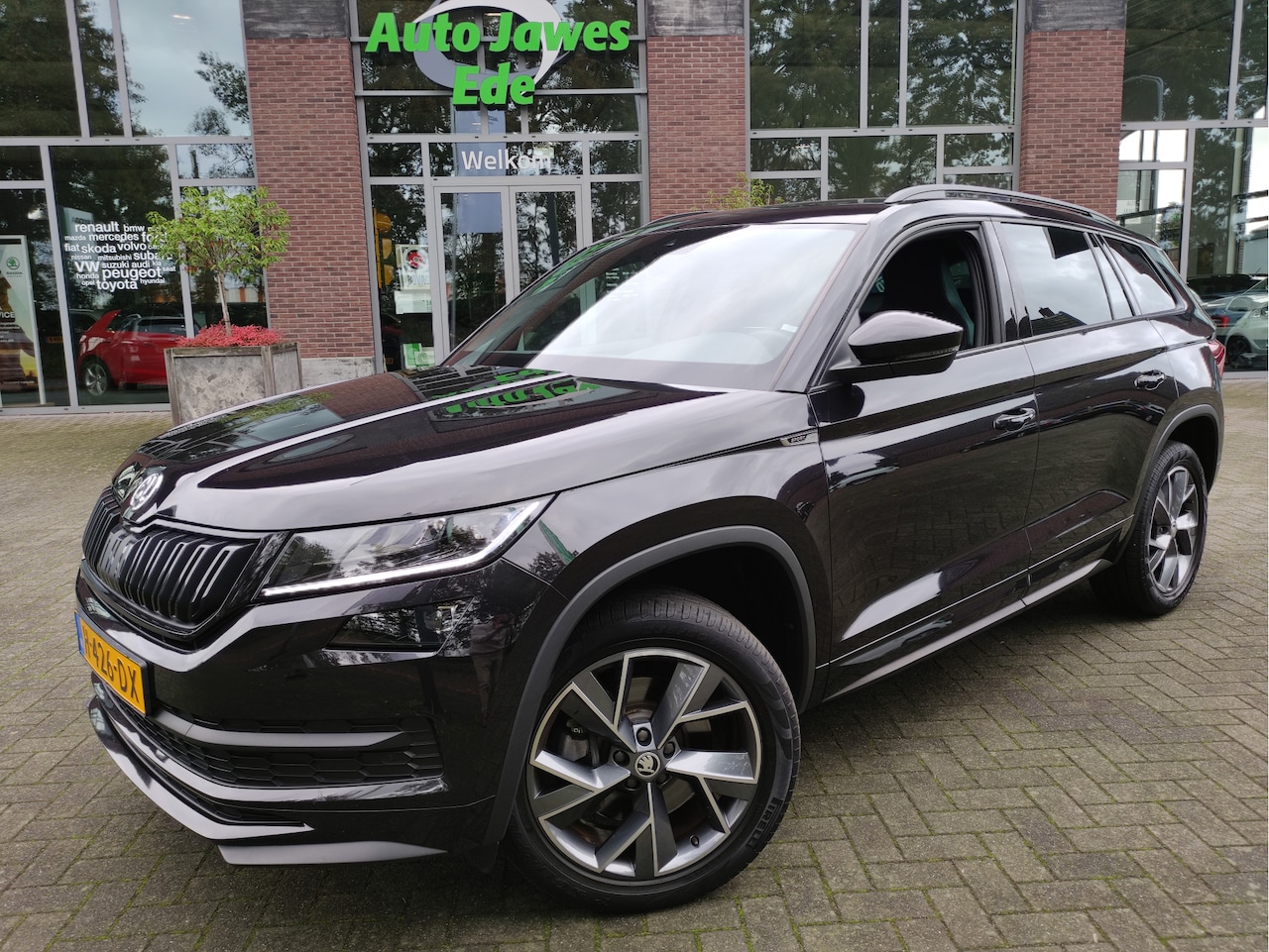 Skoda Kodiaq - 2.0 TSI DSG 190PK 4x4 Sportline Business Trekhaak - Adaptieve Cr.control - Leder/Alcantara - AutoWereld.nl