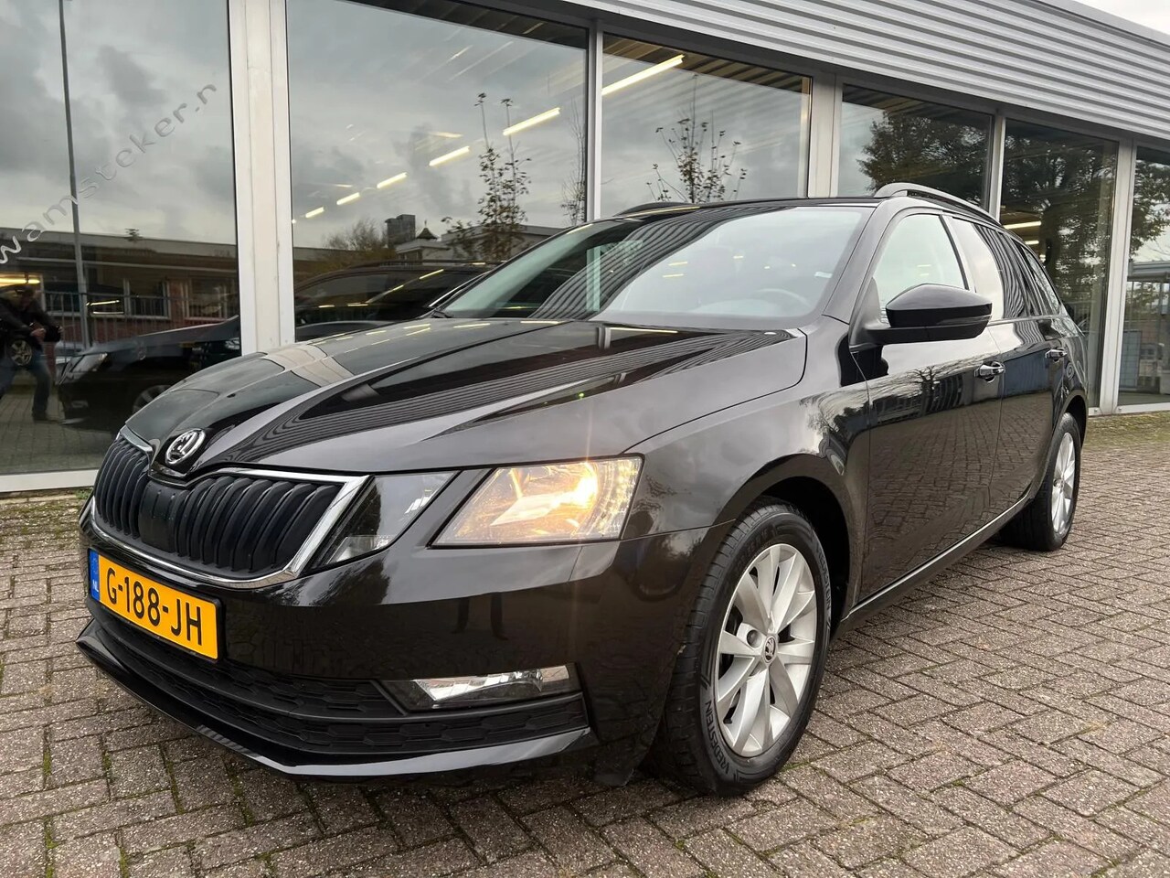 Skoda Octavia Combi - 1.0 TSI Business Edition 1.0 TSI 115PK Business Edition, Navi, Trekhaak - AutoWereld.nl