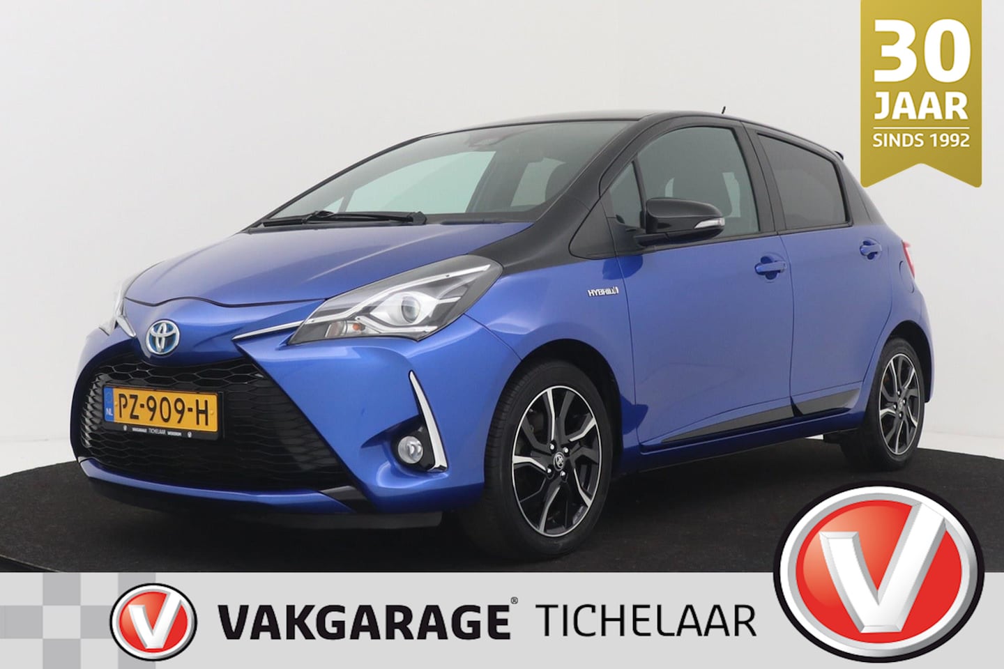 Toyota Yaris - 1.5 Hybrid Bi-Tone | Org NL | Climate Control | Navigatie | Camera | Volledig Ond. | - AutoWereld.nl