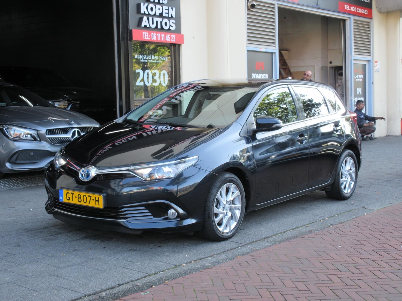 Toyota Auris - 1.8 Hybrid Lease Aut Navi Clima Camera PDC Pano - AutoWereld.nl