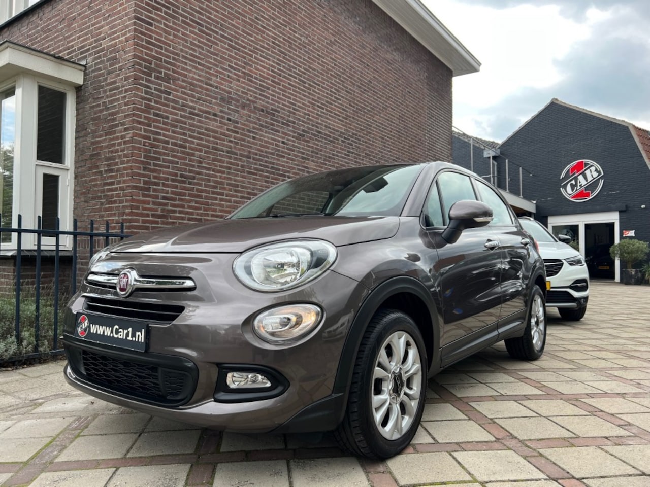 Fiat 500 X - 1.4 Turbo MultiAir Lounge AUTOMAAT NAVI PDC CRUISE  KEYLESS - AutoWereld.nl