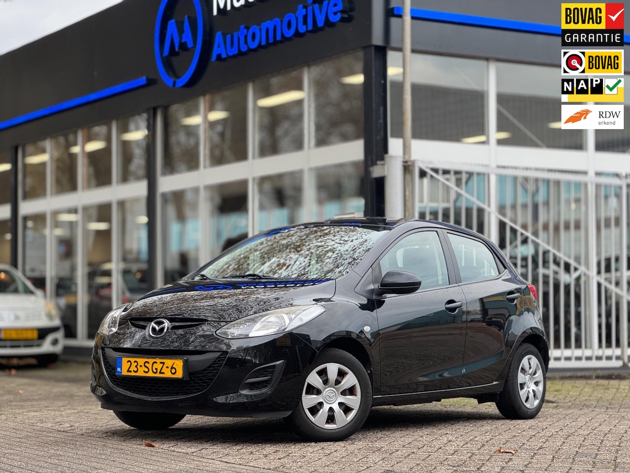 Mazda 2 - 1.3 BIFUEL|Fabrieksaf LPG|Airco|1e eigen|Nieuwe APK|5deurs|Lage KM|Elek.ramen|Topstaat|Rij - AutoWereld.nl