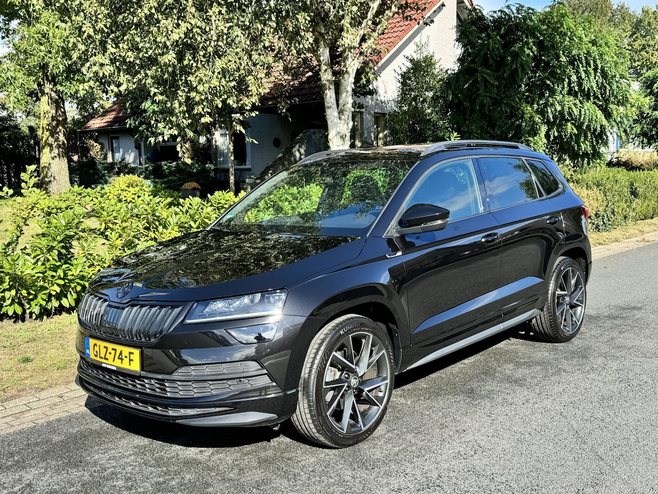 Skoda Karoq - 2.0 TSI 4x4 Sportline 190PK DSG•Pano•LED - AutoWereld.nl