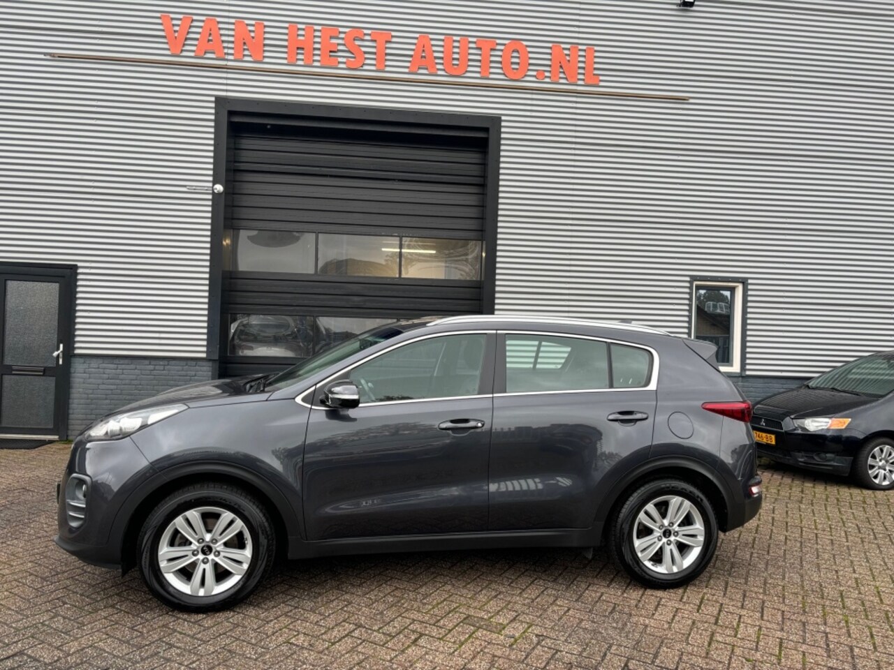 Kia Sportage - 1.6 GDi Navi Edition 6 MND GAR AIRCO NAVI CRUISE CONTROL SPORTVE - AutoWereld.nl