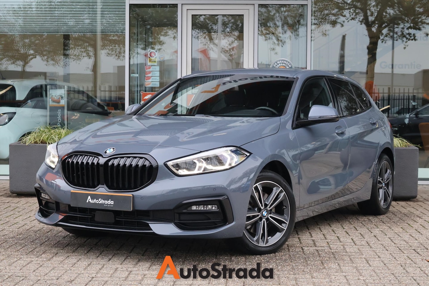 BMW 1-serie - (f40) 118i Sportline 136pk Aut | Storm Bay | Carplay | Cruise | DAB | 1e Eigenaar - AutoWereld.nl