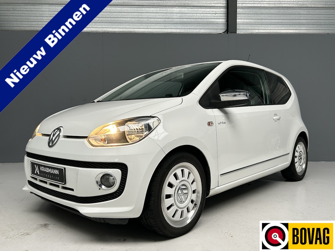 Volkswagen Up! - 1.0 high up! White Up 75pk|Navi|Cruise|PDC - AutoWereld.nl