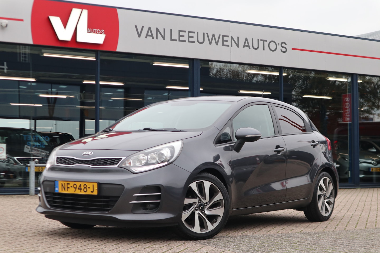 Kia Rio - 1.2 CVVT ExecutiveLine | Nieuw binnen | Lichtmetalen velgen | Navi | Parkeer sensor | - AutoWereld.nl