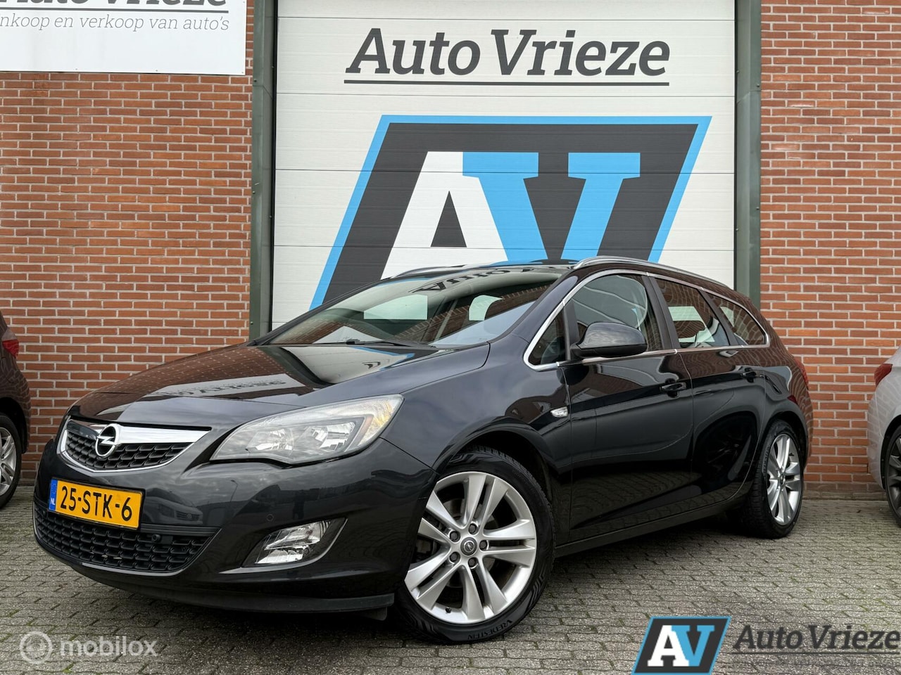 Opel Astra Sports Tourer - 1.6 Turbo GT Stoelverwarming, Trekh - AutoWereld.nl