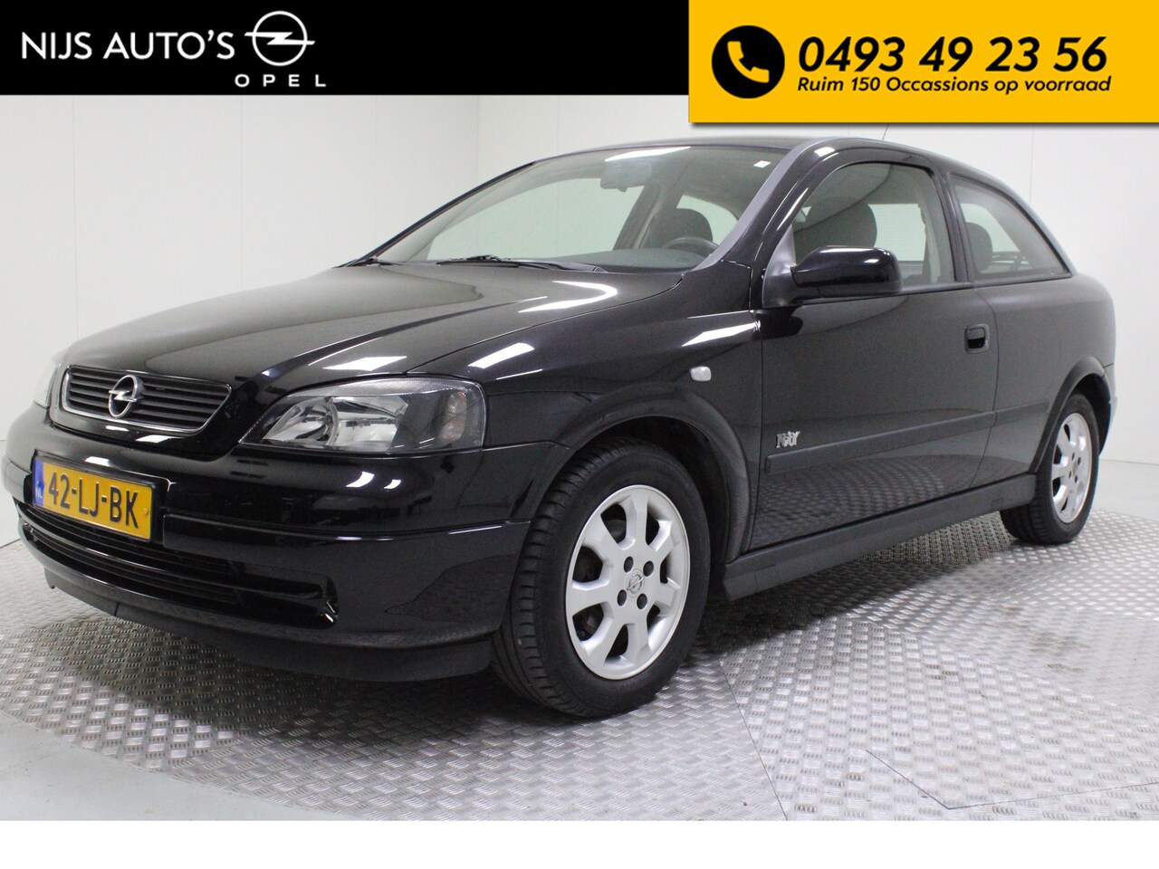 Opel Astra - 1.6 Njoy | airco | dealer onderhouden | cruise control | elektr. ramen | electr. spiegels - AutoWereld.nl