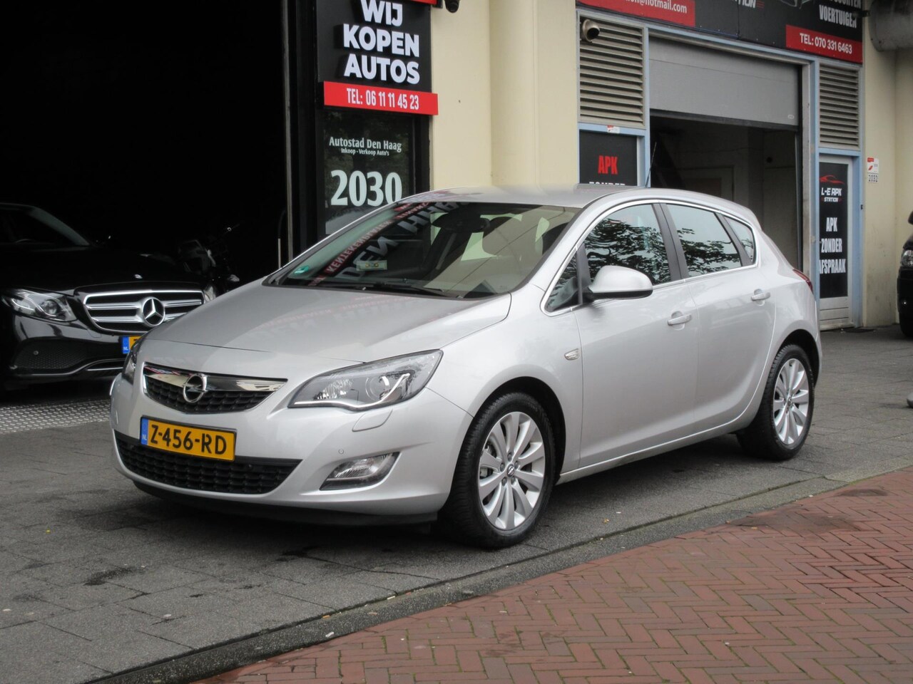 Opel Astra - 1.6 Sport Automaat Stoel/Stuurverwarming Xenon/Led - AutoWereld.nl