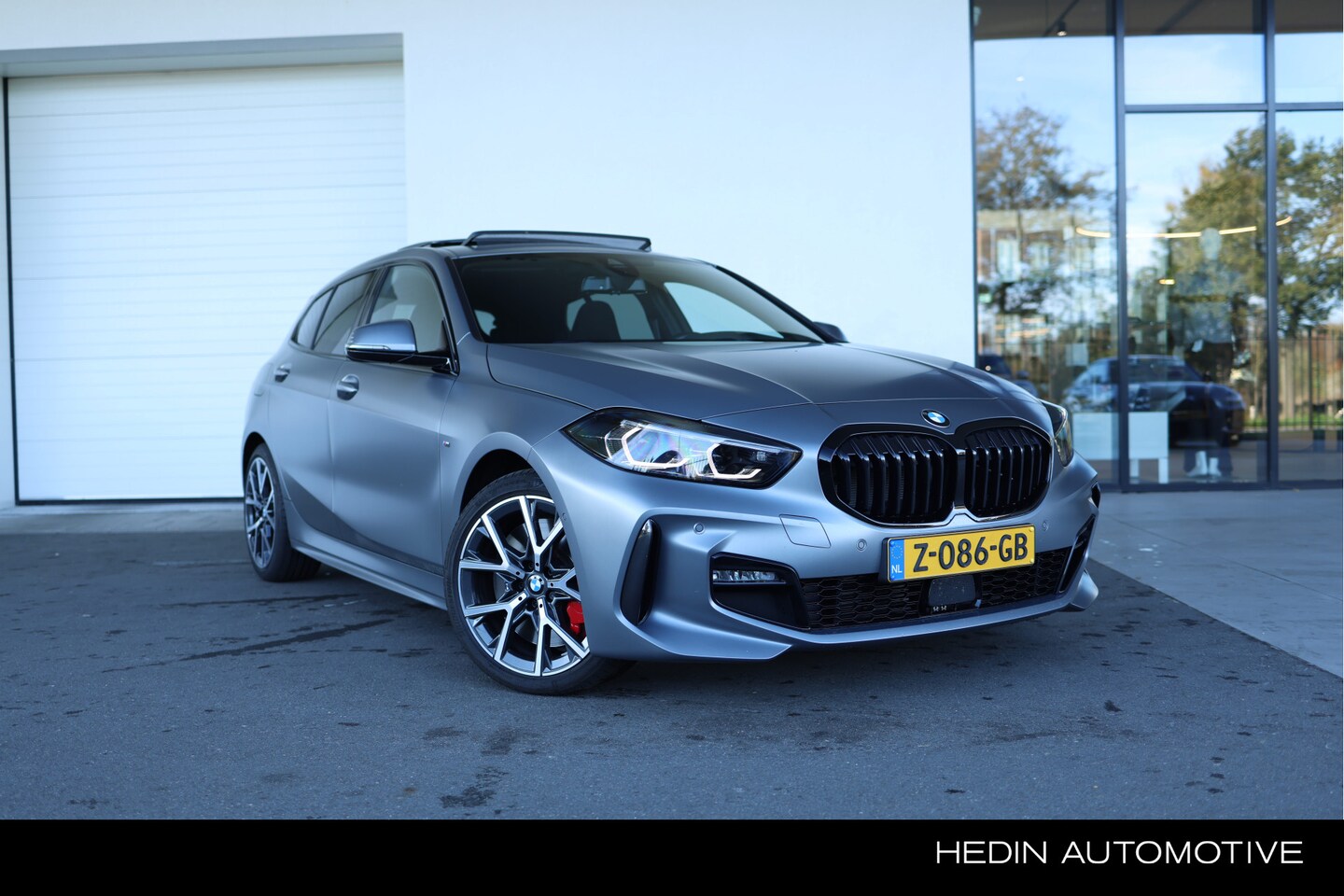 BMW 1-serie - 118i Executive | Glazen Panoramadak | Hifi System | Stoelverwarming | Achteruitrijcamera | - AutoWereld.nl