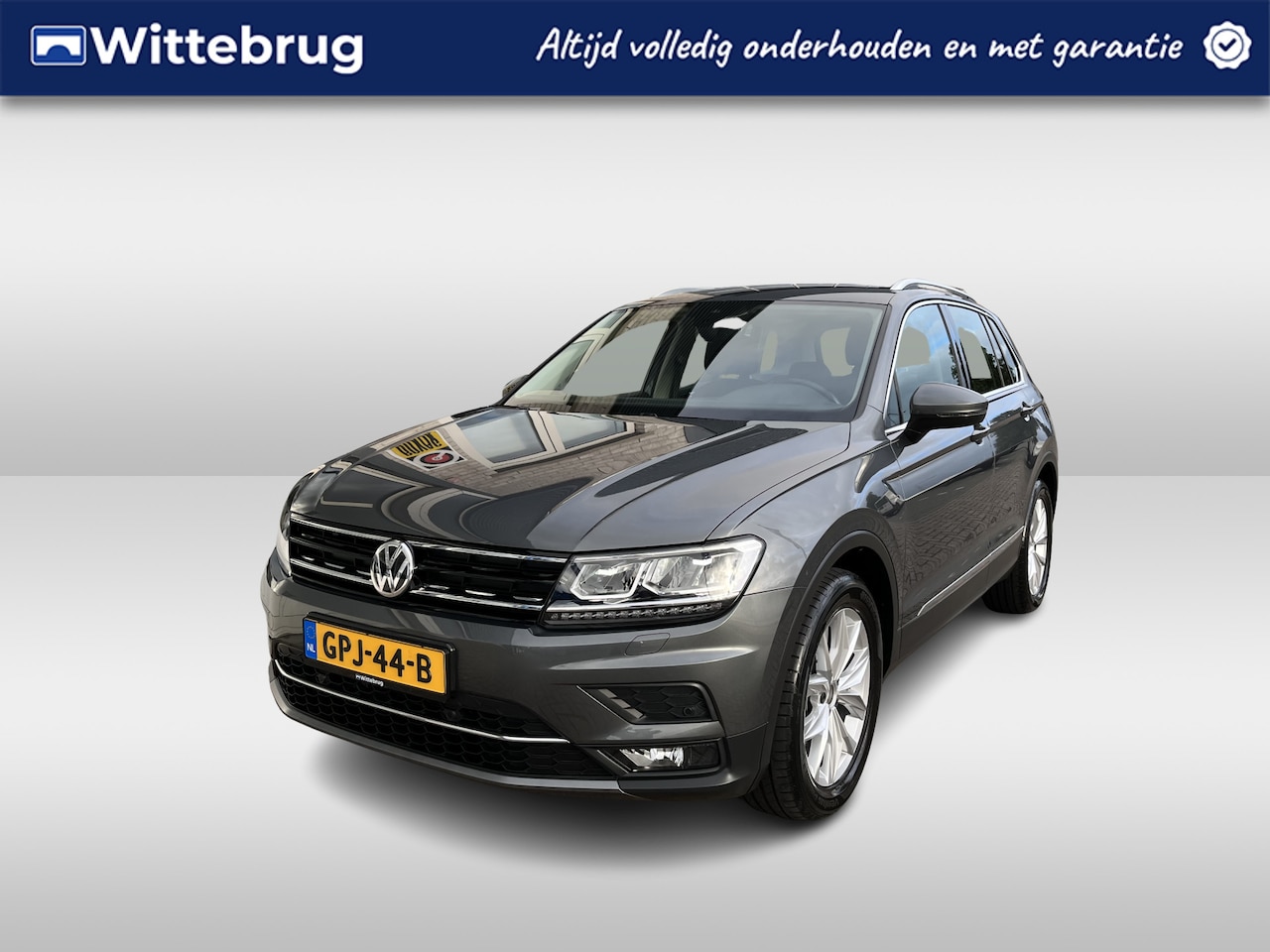 Volkswagen Tiguan - 1.5 TSI Highline / AUTOMAAT/ PARK. SENSOREN/ STOEL VERWARM./ ADAPT. CRUISE/ BLUETOOTH/ NAV - AutoWereld.nl