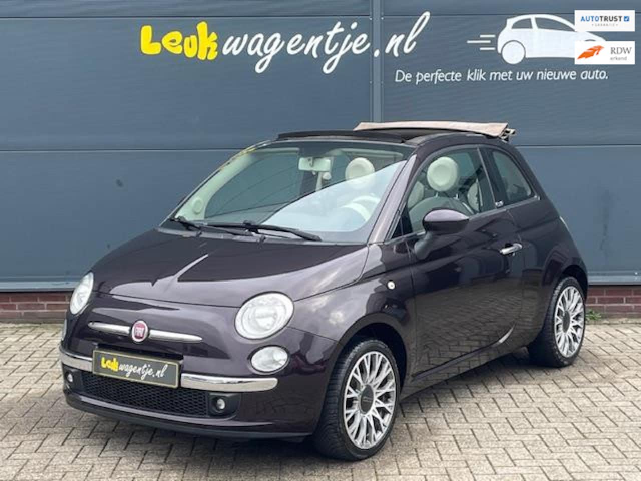 Fiat 500 C - 1.2 Lounge Cabrio *navi *16 inch *paars metallic - AutoWereld.nl