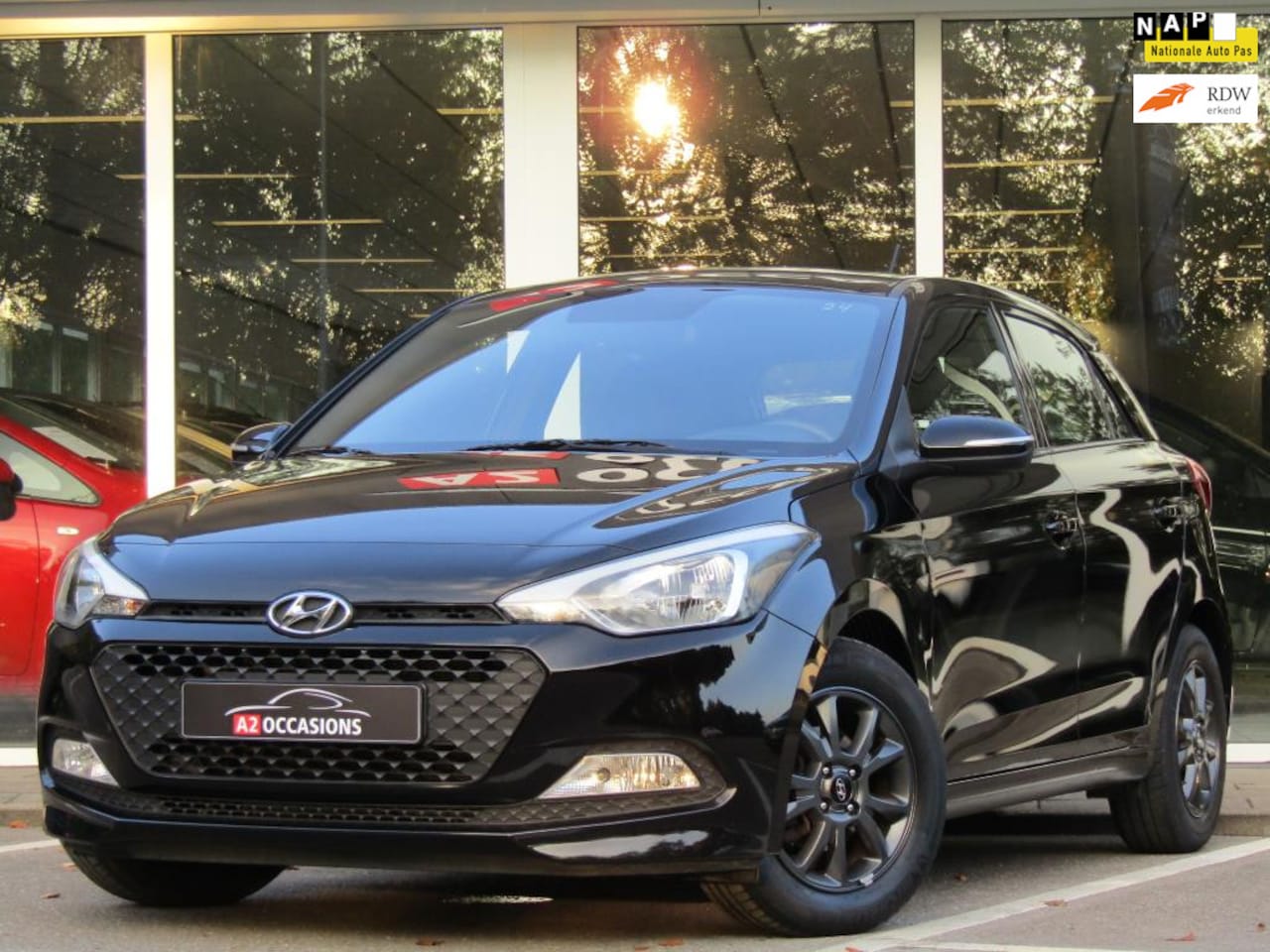 Hyundai i20 - 1.2 85pk Airco/Bluetooth/Stoel en stuurverwarming! - AutoWereld.nl