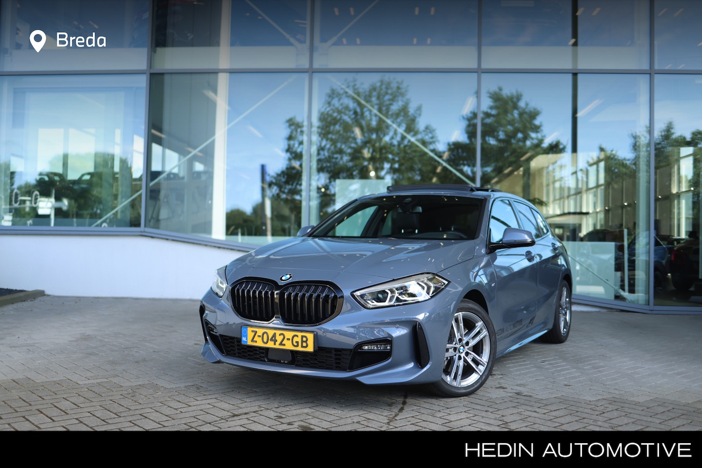 BMW 1-serie - 118i Executive | M-Sport | HiFi | PDC | Panoramadak elektrisch | Comforttoegang | - AutoWereld.nl