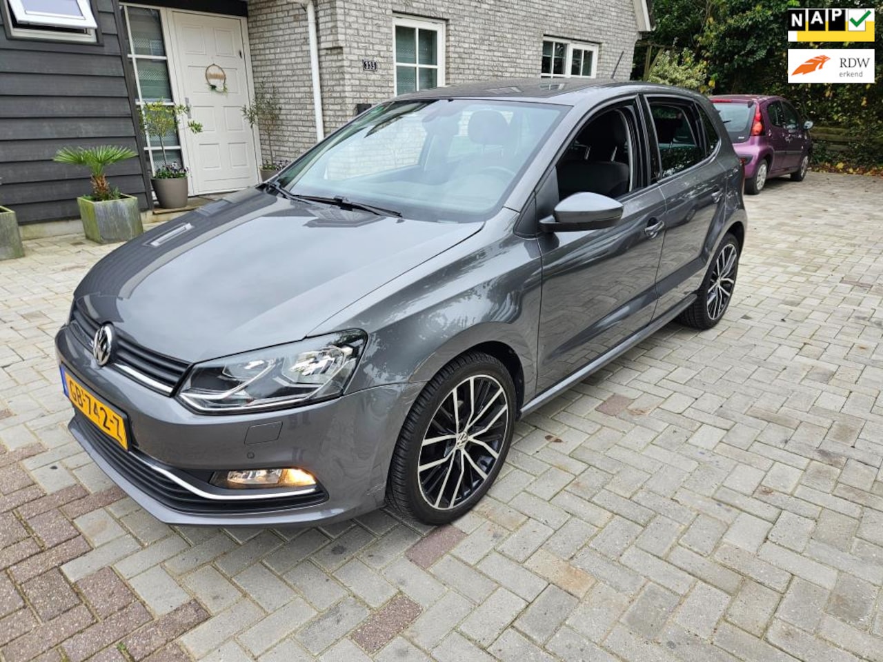 Volkswagen Polo - 1.2 TSI Comfortline/navi/airco/5drs - AutoWereld.nl