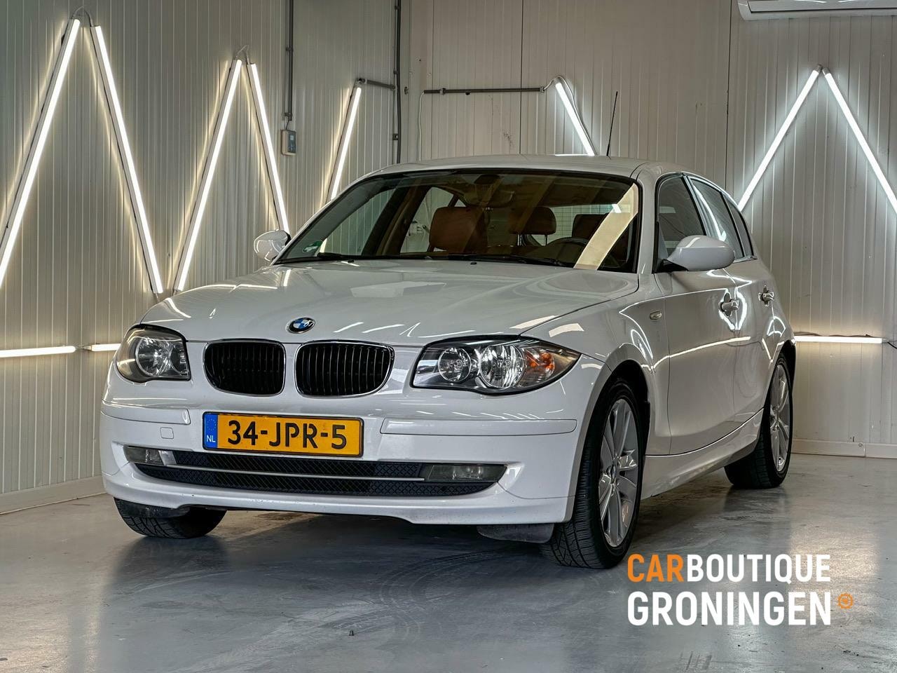 BMW 1-serie - 116i Corporate 2009 5D | AIRCO | LEDER | DBKETTING NIEUW - AutoWereld.nl