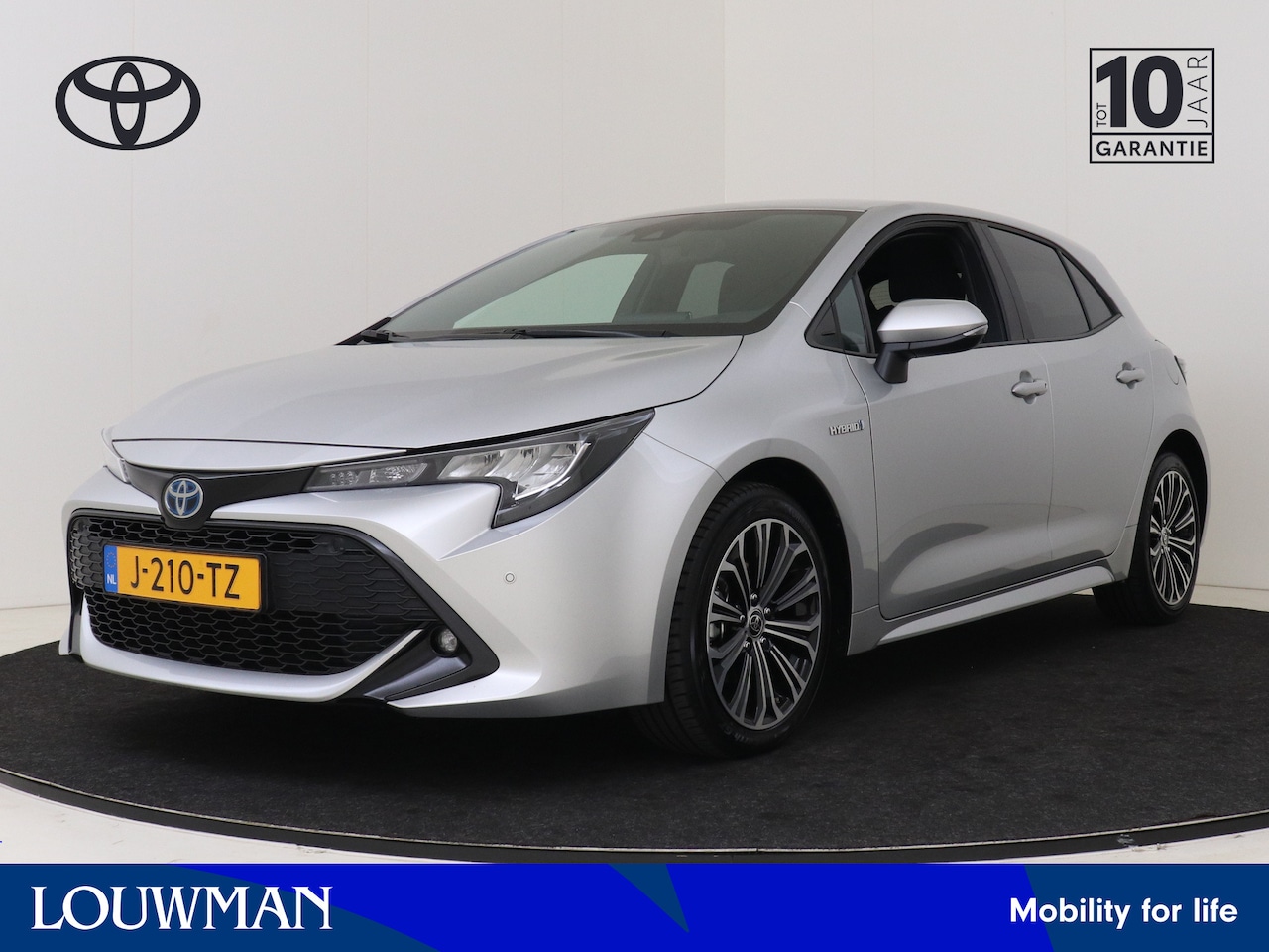 Toyota Corolla - 1.8 Hybrid Dynamic I Apple Carplay/Android Auto I Climate Control I Stoelverwarming | Adap - AutoWereld.nl