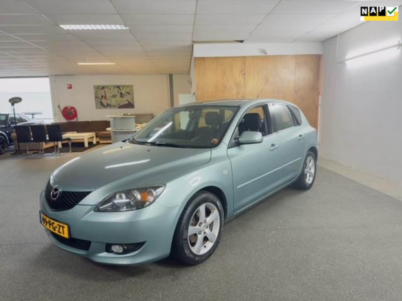 Mazda 3 Sport - 1.6 Touring Apk Nieuw,Airco,E-Ramen,Trekhaak,N.A.P,Lm velgen,5Deurs,Weinig kilometers,Tops - AutoWereld.nl