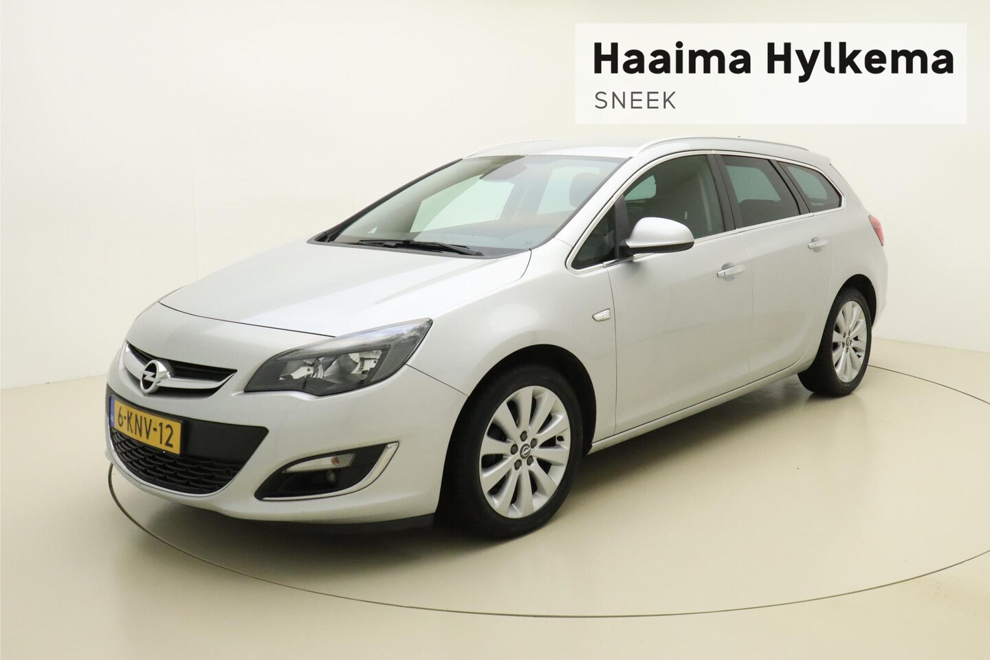 Opel Astra Sports Tourer - 1.4 Turbo Cosmo | Lederen/Verwarmbare Stoelen | Navigatie | Trekhaak | Climate Control | P - AutoWereld.nl