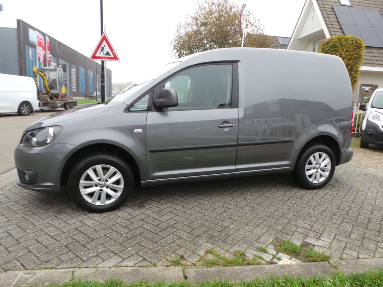 Volkswagen Caddy - 1.6 TDI 75pk Airco,Cruise,Pdc,Lmv sportstoelen - AutoWereld.nl