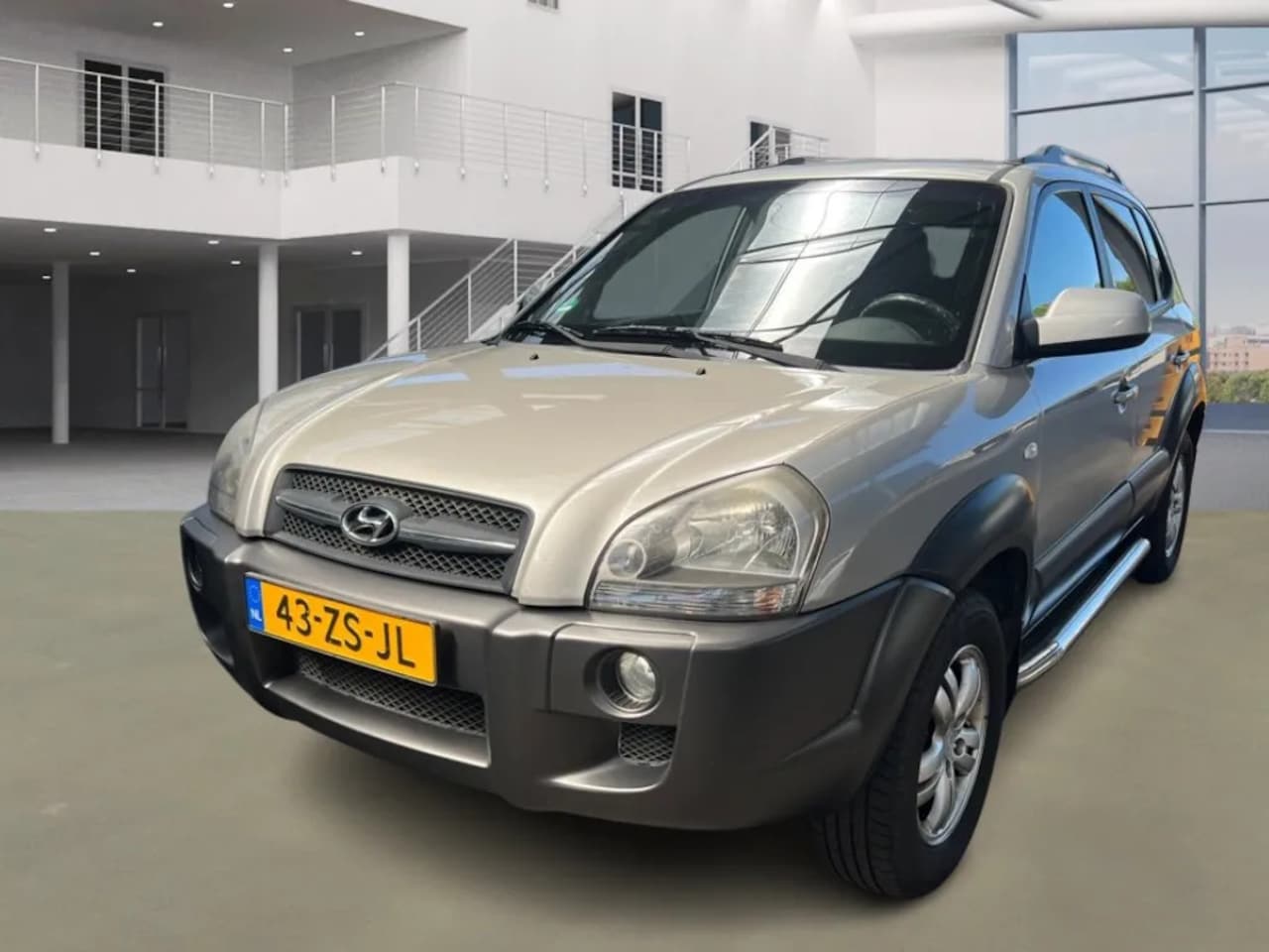 Hyundai Tucson - 2.0i Style 2.0i Style - AutoWereld.nl