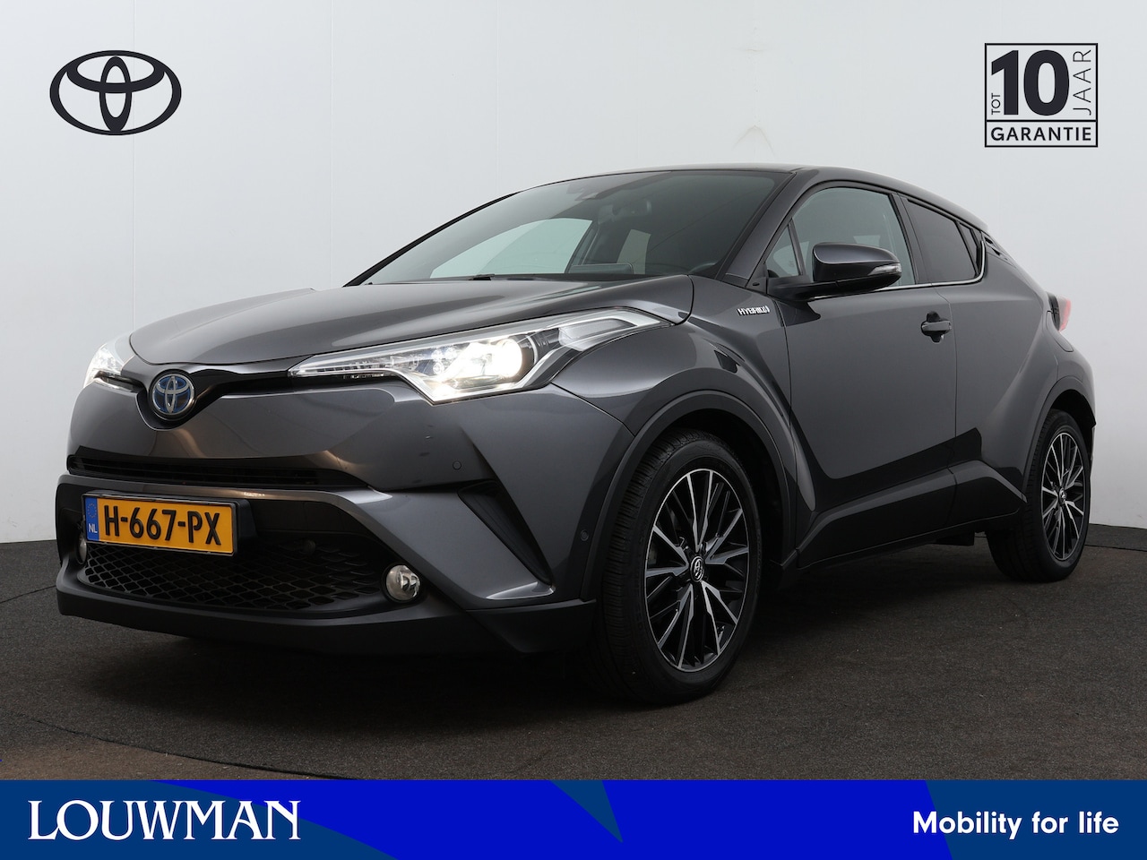 Toyota C-HR - 1.8 Hybrid Executive | Navigatie | Camera | LM Velgen | - AutoWereld.nl