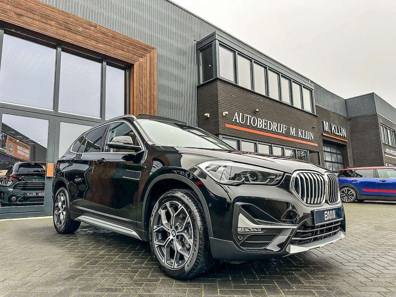 BMW X1 - SDrive18i High Executive X line aut/pano/navi/camera/19"/led/btw - AutoWereld.nl