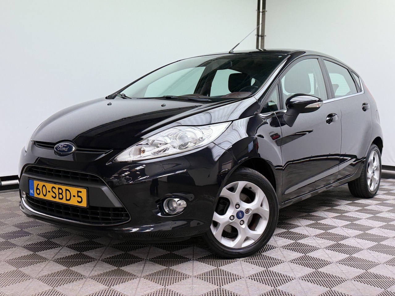 Ford Fiesta - 1.25 Titanium 5-drs Airco PDC LM15" NL Auto - AutoWereld.nl