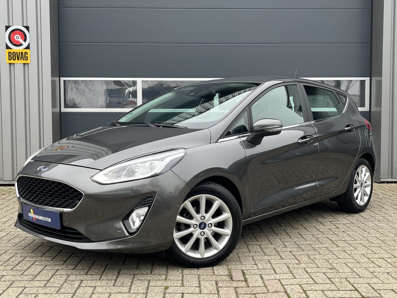 Ford Fiesta - 1.0 EcoBoost Titanium | Navi | Camera | Carplay | Cruise & Climate Control | PDC - AutoWereld.nl