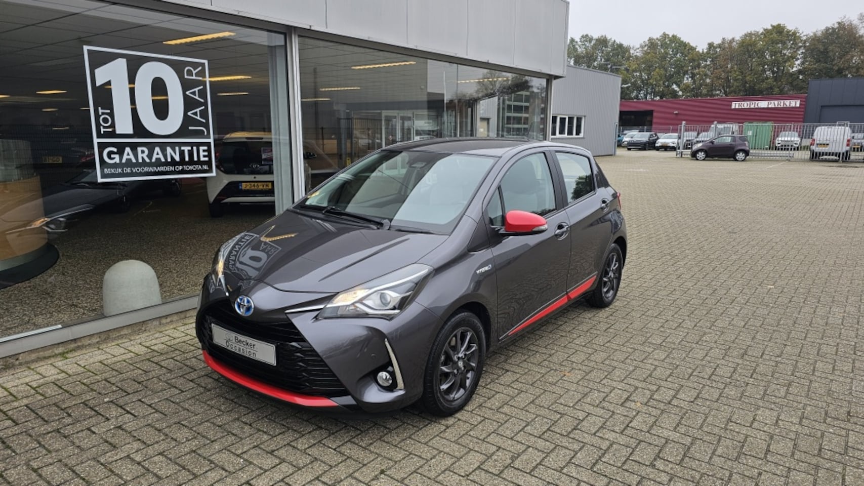 Toyota Yaris - 1.5 Hybride Design Red All-in | dealeronderhouden - AutoWereld.nl