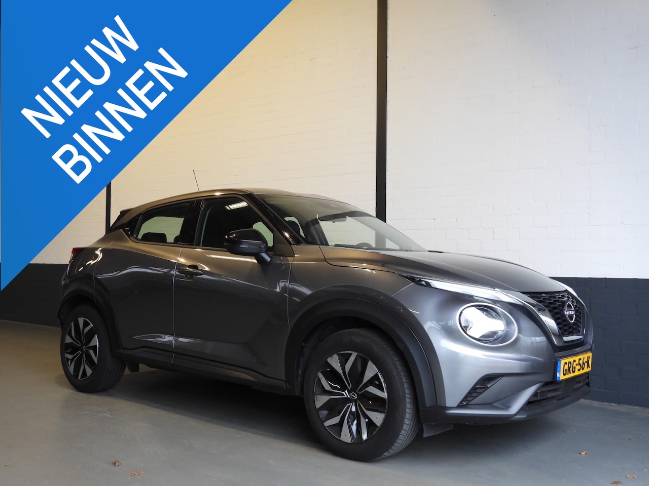 Nissan Juke - 1.0 DIG-T Acenta NAVI-APP/CAMERA/AIRCO/CRUISE! - AutoWereld.nl