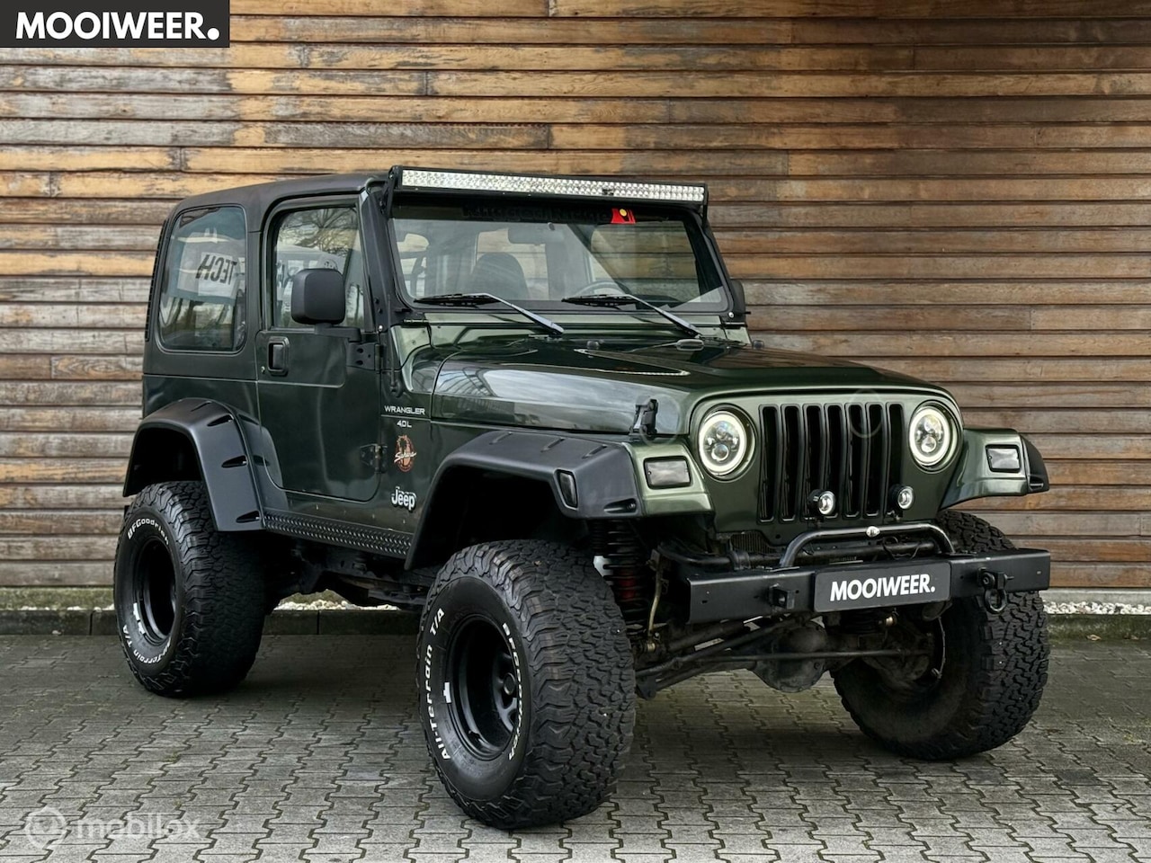 Jeep Wrangler - 4.0i Hardtop Sahara edition | Liftkit - AutoWereld.nl